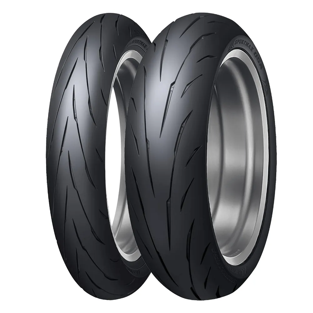 A pair of motorcycle hypersport tyres on a white background